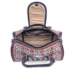 Our stunning cross-body bag is ready to have you turning heads. The intricate embroidery, featuring traditional Indonesian designs lends to its beauty, while its generous size makes for a gorgeous everyday handbag. The Nano Bag is not only beautiful, but it's 100% cruelty-free. Whether you are vegan or looking for ethical and artisanal-made, the Nano Bag is a top choice for the conscious consumer. 
      Snap button closure on the exterior front.  Three pockets including one zippered in the cott Traditional Satchel For Travel, Luxury Embroidered Crossbody Bag, Artisan Style Bag With Removable Pouch, Luxury Embroidered Travel Bags, Traditional Top Handle Bag With Removable Pouch, Traditional Travel Bag With Top Carry Handle, Embroidered Top Handle Travel Bag, Embroidered Crossbody Shoulder Bag For Travel, Traditional Shoulder Bag With Detachable Handle