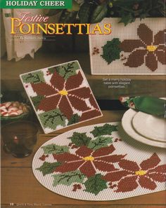 a christmas table setting with poinsettias on the plate and placemats