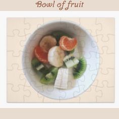 a bowl of fruit is shown with puzzle pieces in the background and words above it