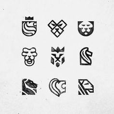 a bunch of logos that are drawn in black and white on a piece of paper