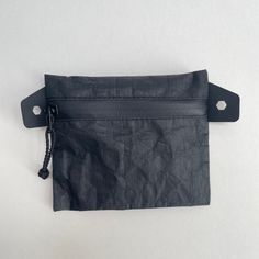 Accesory bag made with Dyneema ® CT5K.18/blkwov4 with Positive Locking Cord INVISTA CORDURA® zipper pulls and Hypalon pull tabs. The zipper is water resistant. Useful for storing outdoor activity items or day by day use like power banks, cables, ect. Size: 14 x 11cm (Aprox.) Materials: Dyneema ® CT5K.18/blkwov4 Color: Black Bridesmaid Gift Bags, Black Order, Bridesmaid Bags, Power Banks, Day By Day, Outdoor Activity, Zipper Pulls, Bags Purses, Bridesmaids Gifts