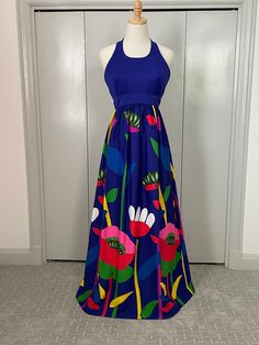 "1970s Tori Richard Royal Blue Floral Halter Maxi Dress ~ Stunning, psychedelic \"flower power\" halter maxi dress from Liberty House Hawaii. Beautiful large floral print fabric. Great dress for drinks by the pool, dining beachside or your holiday get-away. Dress has back zip and built in bra. Bust 34\", waist 25\" and full dress length is 56\" long (skirt is 43\"). Very good vintage condition, slight wear throughout." Spring Blue Floral Print Halter Dress, Fitted Blue Floral Print Halter Dress, Blue Floral Print Halter Dress, Multicolor Floral Print Halter Neck Maxi Dress, Bohemian Blue Halter Dress For Spring, Multicolor Spring Halter Maxi Dress, Spring Multicolor Maxi Halter Dress, Multicolor Maxi Halter Dress For Spring, Multicolor Floral Print Maxi Halter Dress