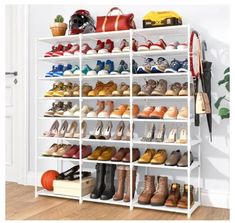 a white shoe rack filled with lots of shoes