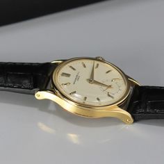 Vintage, Circa 1948, Patek Philippe Gentleman's 18K Yellow Gold, Calatrava Wrist Watch, Model # 300226, Serial # 928902, 31 mm, Caliber 96 18 Jewel Automatic Movement, Restored 12/2019 by Authorized Patek Watch Center, Original Cream Dial with Small Seconds, with New Genuine Black Leather Band. ( NO GOLD BUCKLE CURRENTLY BUT AVAILABLE FOR EXTRA FEE) Vintage Estate 14kt Gold, all items have been tested and examined. These are all one of a kind items. Shipping: All items are hand-picked and packed Classic Yellow Gold Watch Bands With Round Dial, Antique Formal Watches With Subdials, Classic Yellow Gold Watch Bands, Elegant Yellow Gold Self-winding Watch, Classic Yellow Gold Chronometer Watch Accessories, Formal Heirloom Chronometer Watch, Luxury Self-winding Watches For Anniversary, Antique Yellow Gold Watch Bands For Formal Occasions, Luxury Self-winding Round Dial Watches