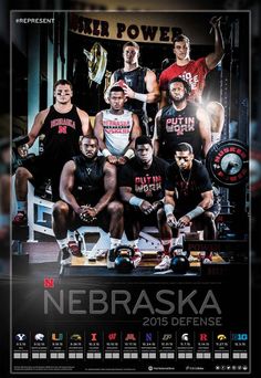 a group of men standing next to each other in front of a sign that says nebraska