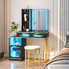 a room with a bed, desk and mirror in it that has blue lights on the side