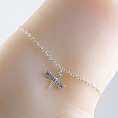 Silver dragonfly anklet made with a lovely and dainty sterling silver dragonfly charm that is suspended on a sterling silver chain with a sterling silver clasp. Choose the size anklet you need from the drop-down menu, bearing in mind that the anklet should be approximately one inch larger than the size of your ankle. The anklet will arrive in an attractive gift box. Dainty Adjustable Sterling Silver Anklets, Silver Anklet With Lobster Clasp For Gift, Delicate Adjustable Silver Anklets, Adjustable Hypoallergenic Sterling Silver Anklets, Silver Anklet, Dragonfly Charm, Silver Anklets, One Inch, Chicago Il