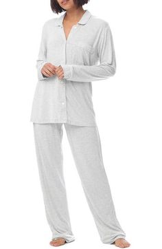 A caress-worthy jersey knit lends alluring drape to the simple lines of classic pajamas. 27" top length; 31 1/2" inseam; 18" leg opening; 10 1/2" front rise; 14" back rise (size Medium) Top has notched collar; long sleeves 92% Tencel® modal, 8% elastane Tencel modal is a sustainably produced fiber made with closed-loop processing and is certified with the EU Ecolabel as having a low environmental impact throughout the entire lifecycle Machine wash, tumble dry Imported This product meets Nordstro Papinelle Sleepwear, Classic Pajamas, Best Sleep, Embroidered Initials, Contrast Piping, Sleepwear & Loungewear, Pj Sets, Simple Lines, Comfortable Outfits