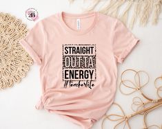 a pink t - shirt with the words straight out to energy on it