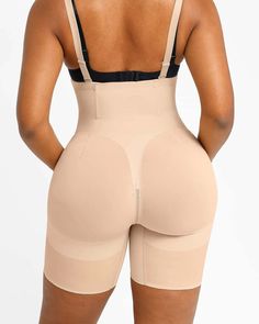 From our groundbreaking shapewear series, this INNER ARMOR™ Butt-Lifting Sculpting Shorts feature four-layer fabric that offers powerful support, along with revolutionary X-shaped sheer details for an hourglass shape. With free-cut hems that prevent digging, these shorts are designed to sculpt and shape your body for a flattering look, including an instant butt lift.Why you'll love it!• Achieve a flattering hourglass figure with a stunning X-shaped design.• Experience added support and reduced r Beige Compression Shapewear With High-cut Leg, Supportive Fitted Shapewear With Built-in Shorts, Beige Full Coverage Compression Shapewear, Compression Shapewear With Built-in Shorts And High-cut Leg, Compression Shapewear With Built-in Bra And Short Leg, Beige Full Coverage Shapewear With Built-in Shorts, High Stretch Beige Shapewear With Built-in Shorts, Supportive Compression Shapewear, High Stretch Short Leg Shapewear