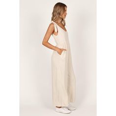 Step up your casual look this season with a linen wide leg jumpsuit. Cut in an easy-to-wear pull on design, it features tie close shoulder straps and an elasticized waist band to create the perfect fit, while functional pockets add practicality. Beige Linen Summer Jumpsuits And Rompers, Chic Linen Jumpsuits And Rompers For Day Out, Summer Linen Jumpsuits And Rompers For A Day Out, Beige Linen Casual Jumpsuits And Rompers, Beige Relaxed Fit Jumpsuits And Rompers For Summer, Sleeveless Linen Jumpsuits And Rompers For Day Out, Sleeveless Linen Jumpsuits For Day Out, Chic Beige Linen Jumpsuits And Rompers, Everyday Summer Jumpsuits And Rompers In Overall Shape