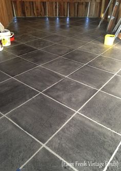 a kitchen floor that has been painted gray