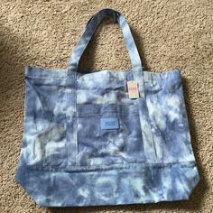 Nwt Victoria’s Secret Pink Blue And White Tie Dye Tote Bag With Zipper Closure, Outside And Inside Pockets Blue Large Capacity Canvas Bag For Spring, Large Capacity Blue Canvas Bag For Spring, Casual Blue Canvas Bag For Spring, Casual Blue Canvas Shopping Bag, Blue Canvas Bag For Everyday Use In Spring, Blue Summer Bags With Pockets, Summer Blue Bags With Pockets, Large Capacity Blue Cotton Bag, Casual Blue Cotton Bag