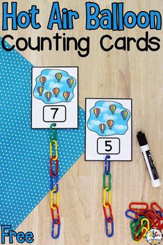 hot air balloon counting cards on a table