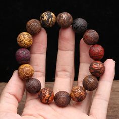 Natural Multicolor Wooden Bracelet Men's 20mm Elastic Bracelet Wooden Bead Lucky Sculpture Mythical Animal Metal Type: NONE Origin: 1005003310174193 Item Shape: ROUND SHAPE Fine or Fashion: Fashion Material: Wood Item Type: Beads Item Weight: 46 Outer Diameter: 20mm Material: natural wood Composed of many natural woods Inner Energy, Karma Bracelet, Buddhist Bracelet, Wenge Wood, Mythical Beast, Wooden Bracelet, Gold Silk, Fashion Materials, Hair Beads