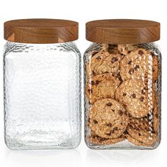 two glass jars filled with cookies next to each other