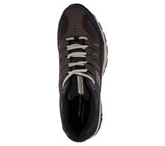 A true classic gets even better with Skechers After Burn - Memory Fit. This lace-up trainer features a leather, synthetic and mesh upper with cushioned Memory Foam insole. | Skechers Men's After Burn - Memory Fit Sneaker Classic Lace-up Walking Shoes With Air Cushioning, Brown Lace-up Sneakers With Air Cushioning, Classic Air-cushioned Lace-up Walking Shoes, Brown Slip-resistant Sports Sneakers, Brown Slip-resistant Sneakers For Sports, Brown Sneakers With Elastic Laces For Sports, Sneaker Design, Skechers Memory Foam, Training Sneakers