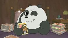 a panda bear sitting on top of a bed next to stacks of books and cards