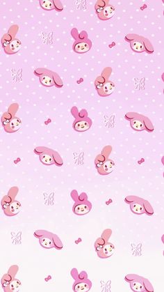 a pink wallpaper with bunny ears and polka dots on the bottom half of it