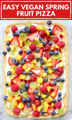 fruit pizza with cream cheese and fresh berries in the middle, ready to be eaten