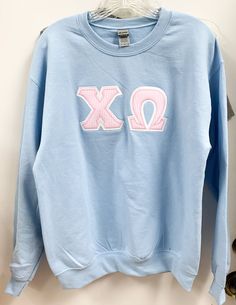 This listing is for ONE Greek letter sweatshirt. Shirt details: Light blue Gildan unisex crew neck sweatshirt, white background letters, and pink seersucker foreground letters. WE HAVE ADDED COMFORT COLORS LIGHT BLUE SWEATSHIRTS (CHAMBRAY) WHERE AVAILABLE IN THE DROP DOWN MENU Please make sure you choose which size you would like in the drop down menu listed above. Policy: All products are custom and hand made. Please allow 2-3 weeks for product to be shipped. If you would like your item to arri Sorority Letters Sweatshirt, Sorority Shirts Letters, Greek Letter Shirts, Light Blue Sweatshirt, Sorority Sweatshirts, Greek Shirts, Pink Seersucker, Letter Sweatshirt