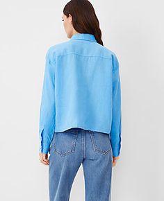 Elevate your wardrobe with the Ann Taylor Cropped Linen Shirt, a testament to effortless elegance and comfort. This cerulean blue top is designed to flatter and move with ease, perfect for any occasion.

- **Size:** XL (Regular fit)
- **Color:** Cerulean Blue
- **Material:** 100% Linen
- **Gender:** Female
- **Features:**
  - Classic straight fit
  - Point collar and long sleeves with button cuffs
  - Button front and back yoke
  - Length: 21" long
  - Machine washable

Crafted from breathable l Trendy Collared Linen Shirt, Casual Cropped Shirt With Button Cuffs, Casual Cropped Blouse With Button Cuffs, Casual Cropped Linen Blouse, Casual Button-up Cropped Shirt With Button Cuffs, Blue Casual Cropped Shirt For Work, Casual Blue Cropped Shirt For Work, Cropped Linen Top For Fall, Casual Blue Button-up Cropped Shirt