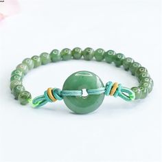 Item Details Material: Jade Jadeite Size:6mm High-quality Jewelry included the handicraft fee. The picture is enlarge , please check the size. Use occasion: You can take it as a gift gor your  lover, your family, your friend. Test: All of our items, we test them before e get  them from factory,when you ge it, you can retest by acid test or go to the professional jewelry test  office. Green Gemstone Beads Round Bracelets, Green Gemstone Beads Round Bracelet, Green Jade Gemstone Beads Bracelets, Hand-strung Green Jade Bracelets, Green Hand-strung Jade Bracelets, Green Jade Bracelets With Round Beads, Green Aventurine Round Beads Bracelets, Green Crystal Bracelet With Colorful Beads, Casual Green Crystal Bracelet With 8mm Beads