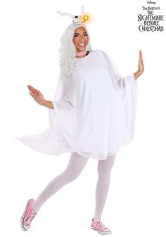 a woman in a white costume is posing for the camera