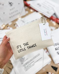 it's the little things pouch hanging on a table full of cards and envelopes