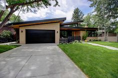 a house with a driveway in front of it