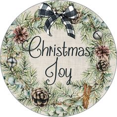 a christmas wreath with pine cones and evergreens on it is the words, christmas joy