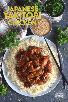 japanese yaktori chicken is served over rice with chopsticks on the side