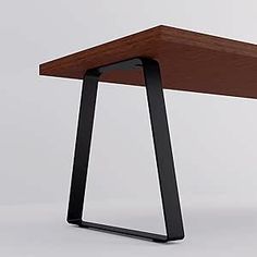 a wooden table with black metal legs and a wood top that has a triangular shape