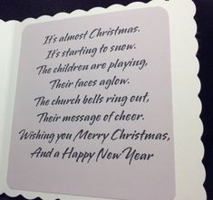 an open christmas card with writing on it