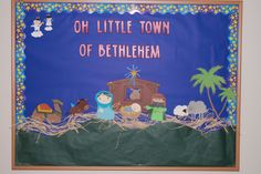 a bulletin board with nativity scene on it