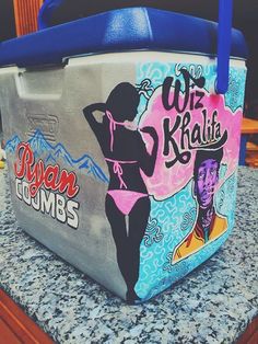 the cooler is decorated with an image of a woman's body and name on it