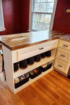 a kitchen island with spice jars on it