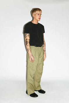 A utility cargo for the ultimate off-duty uniform. Easy-going and relaxed, these cargos are pleated for a slightly wider, straight-leg silhouette. Open the side-zip hems for a sportier 90's aesthetic. Dress down formal blazers and button-ups with an effortless, casual contrast. Combat Parachute Pants With Side Pockets, Streetwear Full Length Parachute Pants With Patch Pockets, Streetwear Full-length Parachute Pants With Patch Pockets, Relaxed Fit Khaki Combat Pants, Relaxed Fit Combat Pants In Khaki, Full Length Parachute Pants With Patch Pockets For Streetwear, Relaxed Fit Combat Bottoms With Cargo Pockets, Relaxed Fit Full Length Cargo Pants With Multiple Pockets, Combat Style Cargo Pants With Relaxed Fit