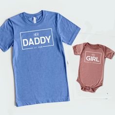 Get ready to celebrate Father's Day in style with these adorable Daddy and Me shirts! This matching set includes a Father Daughter shirt, perfect for creating precious memories together. These family matching outfits are a great way to show your love and appreciation for Dad on his special day. Whether you're looking for a unique Fathers Day gift or just want to surprise Dad with a thoughtful gesture, these shirts are sure to make him smile. Make Father's Day extra special with these cute and co Blue Family Matching Tops For Father's Day, Matching Short Sleeve Shirt For Father's Day, Father's Day Matching Short Sleeve Shirt, Cute Father's Day Shirt With Crew Neck, Cute Crew Neck Shirt For Father's Day, Father's Day Blue Short Sleeve Tops, Blue Tops With Text Print For Father's Day, Customizable Blue Tops For Family Occasions, Cute Blue Shirt For Gift