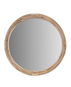 a round mirror with an oval bamboo frame and light wood trim around the edges, on a white background