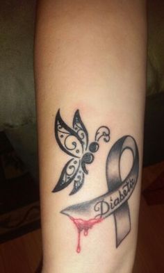 a woman's foot with a tattoo on it