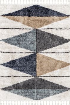 an area rug with different colors and shapes