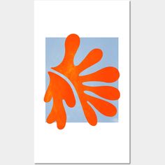 an orange flower on a blue and white background