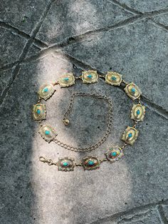 Faux gold and turquoise concho belt Measures approximately 27.5" to first loop and 42.5" to last loop Concho Belt, Candle Wax Melts, Summer Skirts, Accessories Jewelry Earrings, Romper With Skirt, Accessories Earrings, The Chic, Scarf Hairstyles, Ring Bracelet