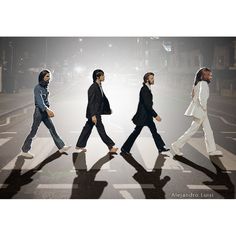 the beatles are walking across the street in front of an advertisement for their new album