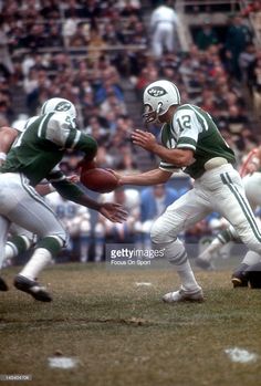 the new york jets'football team in action during a game against the oakland rams on november