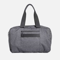 a gray duffel bag with black handles and zippers on the front, sitting against a white background