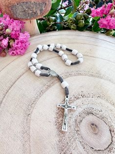 This beautiful authentic handmade peace chaplet is made of carved stone (limestone collected near Apparition Hill) beads, brown waxed cord, Our Lady of Medjugorje/St Jacobs Church steel medal and Medjugorje steel Mir Mir Mir (Peace Peace Peace) cross. Cross is made in Italy. The length is 22cm (8.66 in).  With every purchase you get a holy (prayer) card as a gift. Beads size: approximately 8 mm Cross size: 3 cm (1.18 in) We ship worldwide. Thank you for your visit. God bless. Spiritual Rosary For First Communion, White Rosary With Wooden Beads As Gift, Handmade Crucifix Rosary For Meditation, White Wooden Beads Rosary As Gift, 8mm Bead Crucifix Rosary For Meditation, White 8mm Beads Rosary For Meditation, Handmade White Spiritual Rosary, Our Lady Of The Rocks Montenegro, Our Lady Of Medjugorje