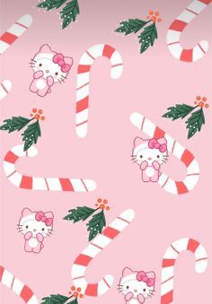 hello kitty christmas wallpaper with candy canes and bows on the pink background, which is