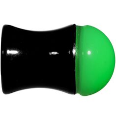 a black and green plastic knob on a white background